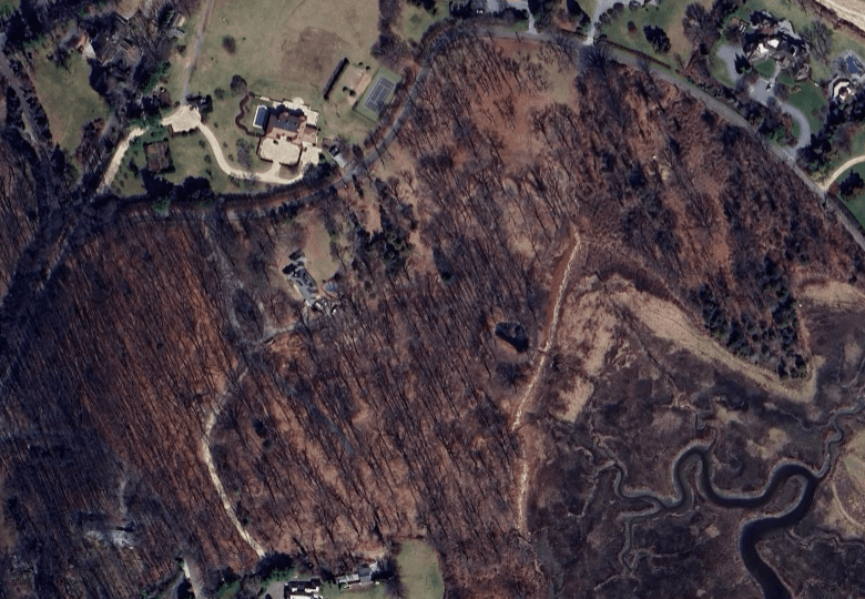 Satellite aerial March 2025 — full clearing complete