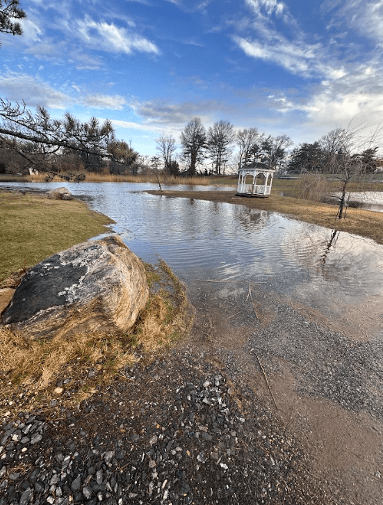 Flooded driveway and road access